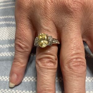 Vintage designer sterling silver ring with cubic zirconia and yellow stones.